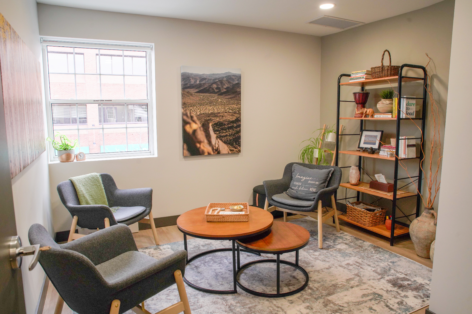 Welcoming therapy office interior with comfortable seating and natural lighting
